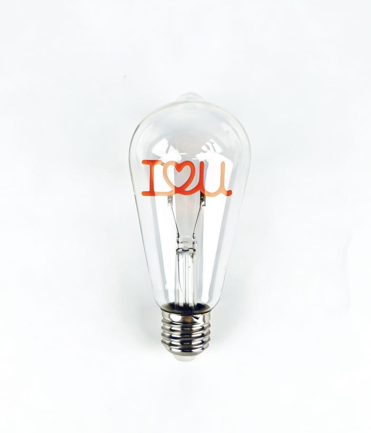 close up LOVE double heart filament LED bulb detail