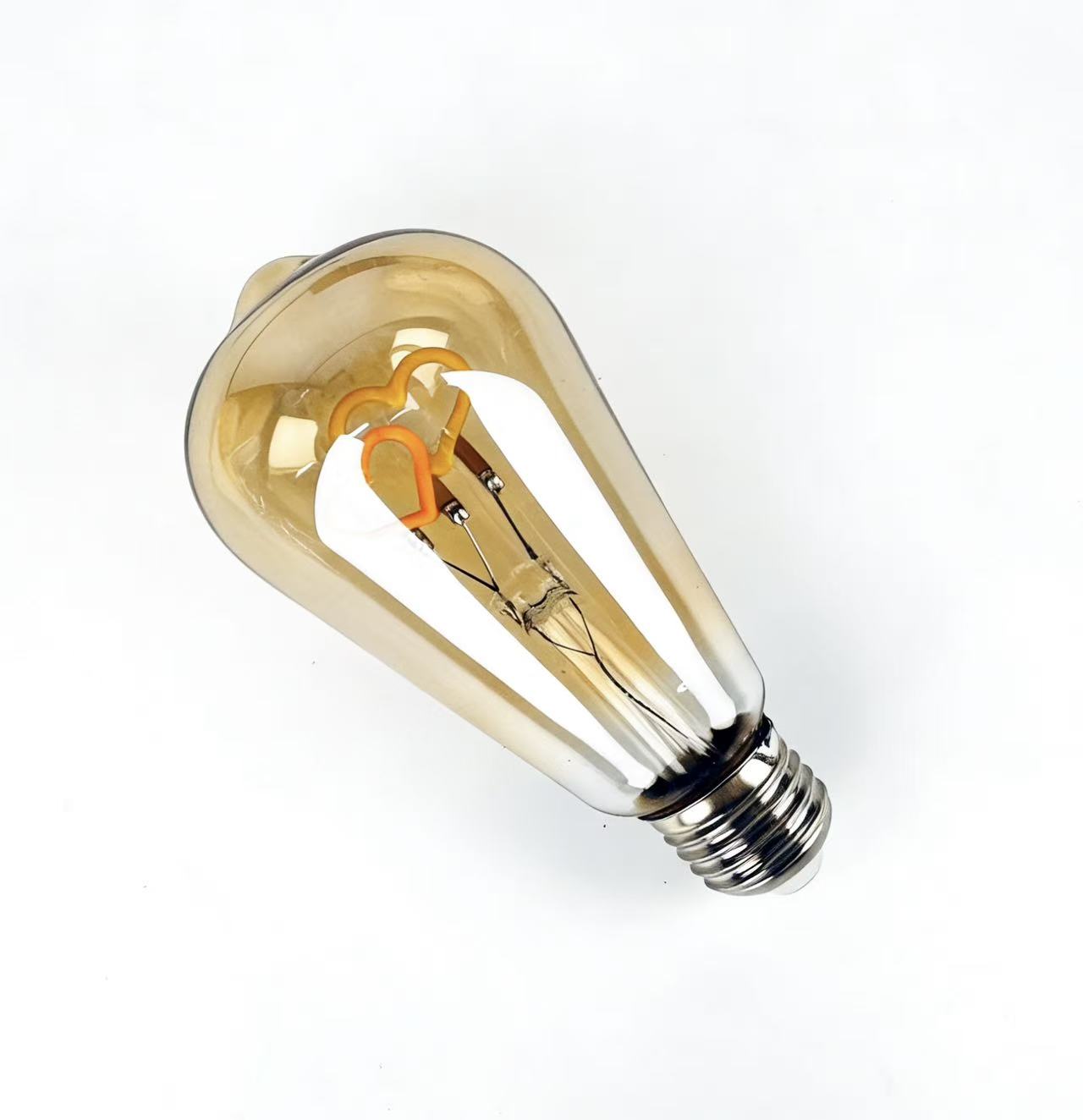 close up I love you filament LED bulb amber glass detail warm light